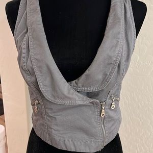 Grab a tunic and put this gray GUESS vest on top!